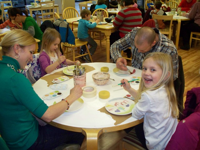 Happy Smiling Family Painting Pottery at Claytopia in Erie PA