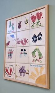 Handprint and Footprint ideas on Studio Wall on ceramic tiles